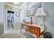 Hallway with a decorative table and view of a bathroom with a shower and toilet at 511 Rough Hewn Ln, Rock Hill, SC 29730
