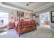 Main bedroom featuring a four-poster bed and ensuite bathroom at 511 Rough Hewn Ln, Rock Hill, SC 29730