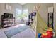 Bright playroom with toys, a rug, and a teepee at 511 Rough Hewn Ln, Rock Hill, SC 29730