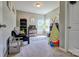 Playroom with a large window and carpet floors at 511 Rough Hewn Ln, Rock Hill, SC 29730