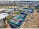 Aerial view of community tennis and pickleball courts close to neighborhood recreational facilities at 6277 Raven Rock Dr, Denver, NC 28037