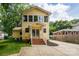 Beautiful two-story home with a well-maintained yard, inviting curb appeal, and mature landscaping at 660 Ideal Way, Charlotte, NC 28203