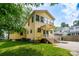 Charming two-story home with lots of windows providing natural light and backyard with mature shade trees at 660 Ideal Way, Charlotte, NC 28203