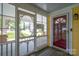 Charming porch view featuring a decorative screen door, and a glimpse of the neighborhood at 660 Ideal Way, Charlotte, NC 28203