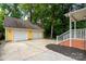 Detached two-car garage with a wide driveway, offering ample parking and storage space at 660 Ideal Way, Charlotte, NC 28203