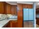 Gourmet kitchen with granite counters, stainless appliances and warm wood cabinets at 660 Ideal Way, Charlotte, NC 28203