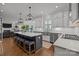 Open concept kitchen features a large island, modern appliances, and plenty of counter space at 6916 Cameron Glen Dr, Charlotte, NC 28210