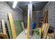 Unfinished basement space for storage, showcasing exposed beams and concrete block walls at 7117 Cobblecreek Dr, Weddington, NC 28104