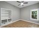 Cozy bedroom with a ceiling fan and window with natural light at 7117 Cobblecreek Dr, Weddington, NC 28104
