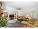 Spacious living room offering comfortable seating, natural light, and seamless transitions to other living spaces at 7117 Cobblecreek Dr, Weddington, NC 28104
