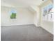 Bright room with neutral carpet, offering comfort and style at 716 Flare Dr, Tega Cay, SC 29708