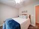 Bright bedroom with a ceiling fan, comfortable bed, and artwork, creating a cozy and inviting space at 8101 Cane Pointe Ln, Waxhaw, NC 28173