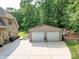 A detached, two-car garage boasts ample space and functionality with a convenient access point at 8101 Cane Pointe Ln, Waxhaw, NC 28173