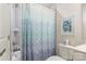 Full bathroom with shower-tub combo featuring calming shower curtain at 819 Anderson St, Charlotte, NC 28205