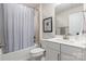 Clean bathroom with modern fixtures, a shower-tub combo, and a white vanity at 819 Anderson St, Charlotte, NC 28205