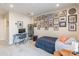 Cozy bedroom featuring a work desk and chair, framed artwork, and comfortable bed at 819 Anderson St, Charlotte, NC 28205