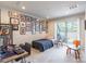 Comfortable bedroom with accent wall and sliding glass door to the outside at 819 Anderson St, Charlotte, NC 28205