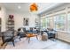 Inviting living room with stylish furniture, area rug, modern lighting, and bright windows at 819 Anderson St, Charlotte, NC 28205