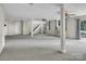 This finished basement offers a large space, plenty of light, and neutral color palette at 9928 Raddington Ln, Charlotte, NC 28269