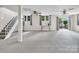 Spacious finished basement with ample lighting, perfect for entertaining and leisure activities at 9928 Raddington Ln, Charlotte, NC 28269