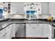 Kitchen with stainless steel appliances and white cabinets at 9928 Raddington Ln, Charlotte, NC 28269