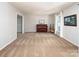 Spacious living room with neutral carpet, ample natural light, and piano at 9928 Raddington Ln, Charlotte, NC 28269