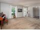 Bright living room features neutral carpet, large windows, and natural light at 9928 Raddington Ln, Charlotte, NC 28269