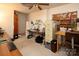 Home office with cabinets, desk, pegboard and carpet floor at 9928 Raddington Ln, Charlotte, NC 28269