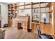 Inviting home office featuring custom wooden built-ins, a desk, and neutral wall paint color at 9928 Raddington Ln, Charlotte, NC 28269