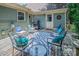 Relax on this stylish patio with comfortable seating, a grill, and outdoor charm at 9928 Raddington Ln, Charlotte, NC 28269