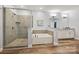 Primary bathroom featuring separate shower and tub at 10022 Wayfair Meadow Ct, Charlotte, NC 28277
