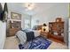 Comfortable bedroom with nice decor, including a blue airplane rug and ample shelf space at 10022 Wayfair Meadow Ct, Charlotte, NC 28277