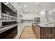 Well-equipped kitchen featuring stainless steel appliances, a large island, and plenty of counter space at 10022 Wayfair Meadow Ct, Charlotte, NC 28277
