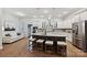 Spacious kitchen with a large island, stainless steel appliances, and a seamless transition to the living area at 10022 Wayfair Meadow Ct, Charlotte, NC 28277