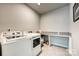 Bright and functional laundry room with modern appliances and ample counter space at 10022 Wayfair Meadow Ct, Charlotte, NC 28277