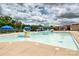 Outdoor pool area with a water slide and umbrellas for Gathering fun at 10022 Wayfair Meadow Ct, Charlotte, NC 28277