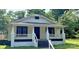 Charming single-story home with inviting front porch and freshly painted exterior at 1012 4Th St, Statesville, NC 28677