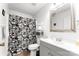 Neutral bathroom with black and white patterned shower curtain and gray vanity at 106 Valley Rd, York, SC 29745