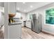 Modern kitchen featuring stainless steel appliances, granite countertops, and ample storage at 106 Valley Rd, York, SC 29745