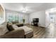 Comfortable living room with large windows, new floors, and neutral tones at 106 Valley Rd, York, SC 29745