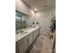Bathroom with dual sinks, vanity with granite countertop and tiled floors at 110 White Apple Way, Statesville, NC 28625