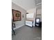 Well-organized garage with a rolling work bench, overhead cabinets, and epoxy flooring, and a dartboard at 110 White Apple Way, Statesville, NC 28625