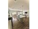 Open-concept kitchen with modern island, pendant lighting, and stainless steel appliances at 110 White Apple Way, Statesville, NC 28625