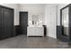 Chic bathroom offers custom vanities, modern lighting, and sleek tile flooring at 1108 Shinnecock Ln, Waxhaw, NC 28173