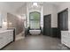 Luxury bathroom features a soaking tub, tiled shower, and elegant fixtures at 1108 Shinnecock Ln, Waxhaw, NC 28173