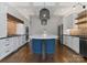 Spacious kitchen with a large island, stainless steel appliances, and custom cabinetry at 1108 Shinnecock Ln, Waxhaw, NC 28173
