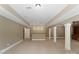 Bright open living area with support columns and bar area at 1108 Shinnecock Ln, Waxhaw, NC 28173