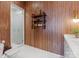 A beautifully designed bathroom with textured wallpaper, a walk-in shower, and marble flooring at 1172 Queens Rd, Charlotte, NC 28207