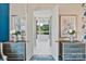 Bright bathroom entryway showcasing a freestanding tub and elegant decor, promising a spa-like experience at 1172 Queens Rd, Charlotte, NC 28207