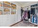 Walk-in closet with custom shelving, drawers, and hanging rods for optimal organization at 1172 Queens Rd, Charlotte, NC 28207
